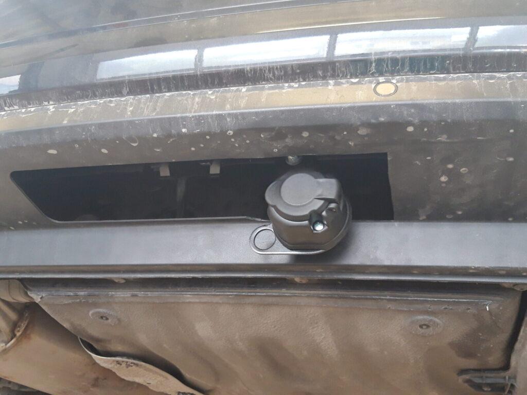 Öffnung und Verschluss des Wagenbeckens eines Fahrzeugs